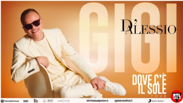 Gigi D'Alessio e la locandina di Dove c'è il Sole Tour